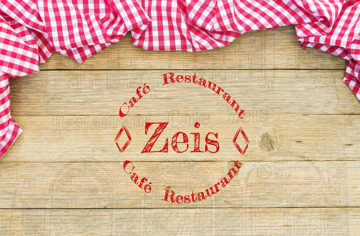 Ein Holzschild mit dem Schriftzug Zeis im Restaurant.